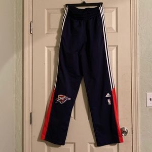 Thunder player warm up pants. Size small but long.